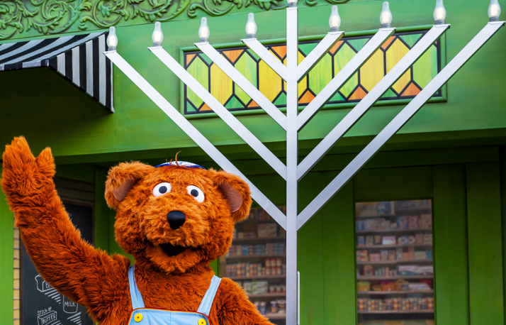 baby bear lighting the menorah