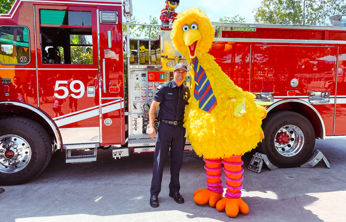 First responder weekend firefighter and big bird.