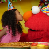 Girl with Elmo