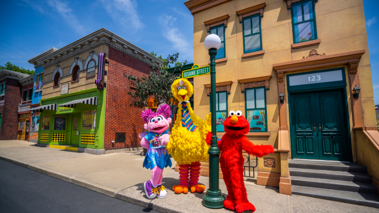 Abby, Big Bird, and Elmo in the Neighborhood