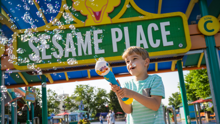 Boy with bubble wand