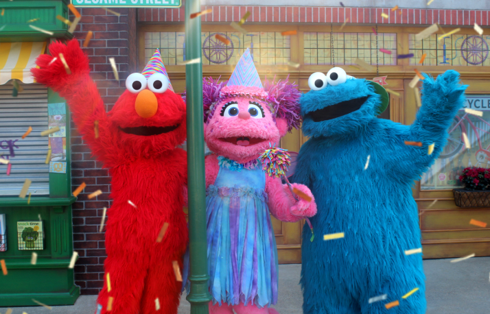 Elmo abby and cookie monster hanging out.
