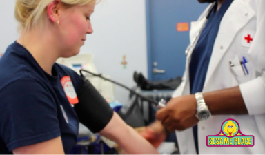 Employee giving blood during an American Red Cross blood drive