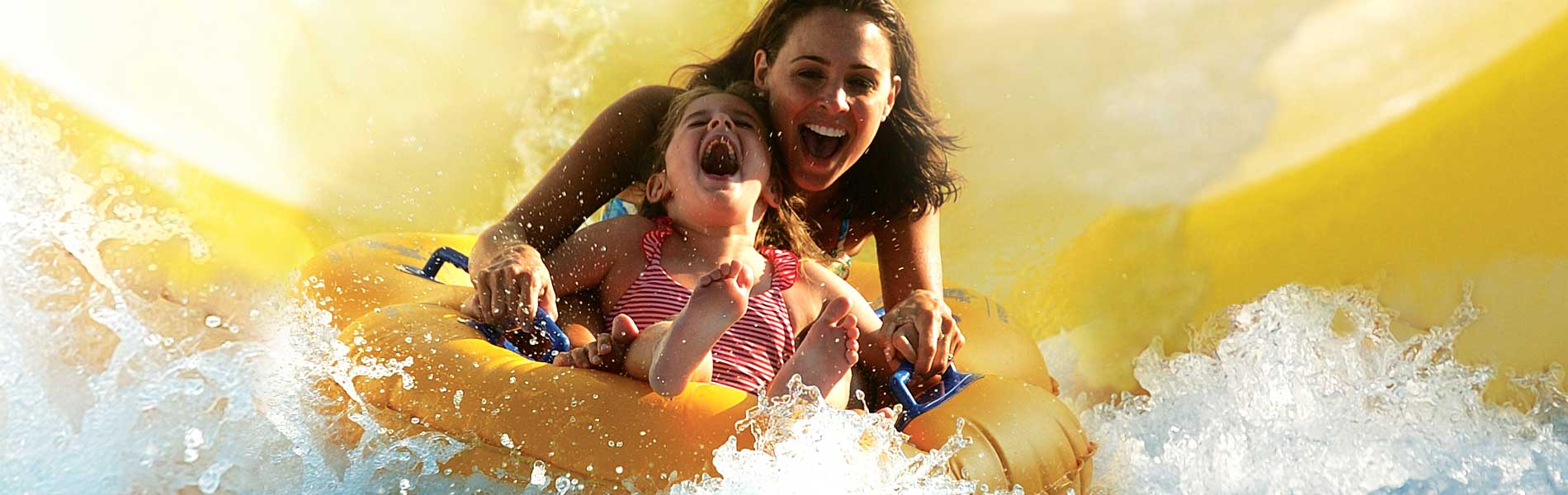Mom and daughter on waterslide