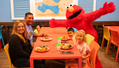 Family dining with Elmo