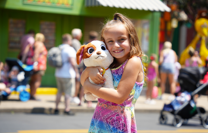 Tango plush and girl.