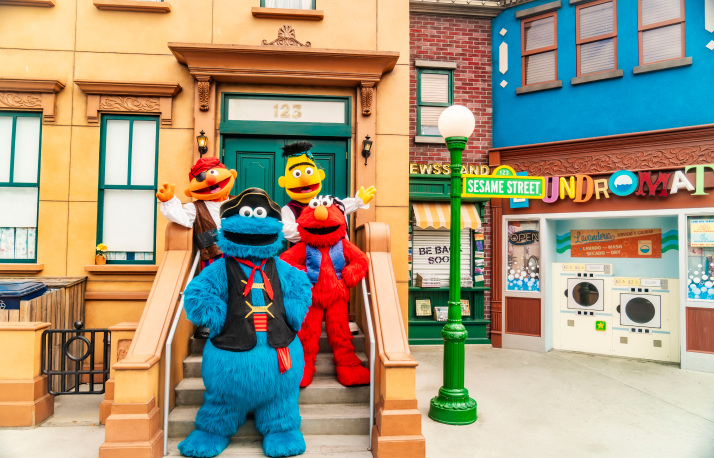 Cookie monster with sesame street friends.
